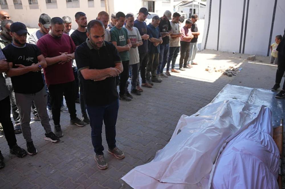 Fotografija uz vijest: U izraelskom napadu dronom na kamp u Gazi ubijeni brat i sestra, sedmoro ranjenih